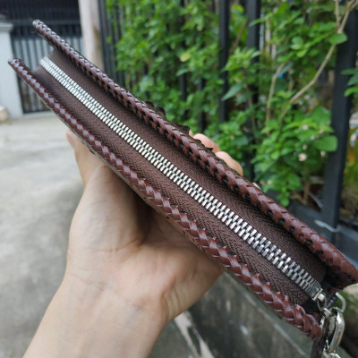 Ví cầm tay gù cá sấu 