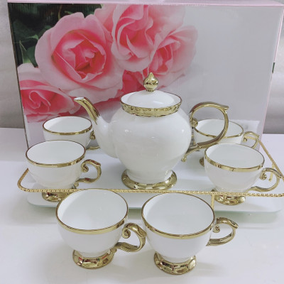 BỘ ẤM CHÉN KÈM KHAY SỨ CAMELIA  TRẮNG VIỀN VÀNG KHUNG KIM LOẠI SANG TRỌNG LCICJ SỰ - ANTH409 