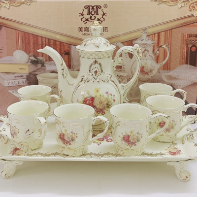 Bộ bình trà sứ phong cách hoàng gia cổ điển màu trắng ngà họa tiết hoa hồng