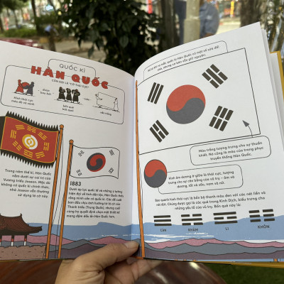 [Bìa cứng, in màu] PHẤP PHỚI CỜ BAY - LỊCH SỬ QUỐC KÌ CÁC NƯỚC CHO TRẺ EM - Robert G. Fresson - Dr. Gấu dịch - San Hô - NXB Phụ Nữ Việt Nam.