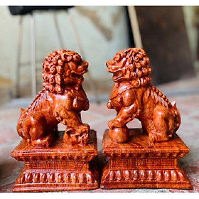 Cặp tượng kỳ lân được làm bằng chất liệu gỗ hương đá liền khối kt cao 20×10×9cm