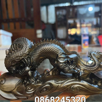 Tượng con rồng bằng gỗ mụn hoa kt 19×10×8cm 