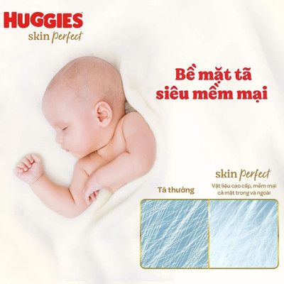 Tã/bỉm dán sơ sinh Huggies Skin Perfect NB 70+4 miếng với 2 vùng thấm giảm kích ứng da