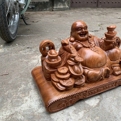 Tượng phật di lặc dâng tiền vàng bằng gỗ hương đá kt 50×23×20cm