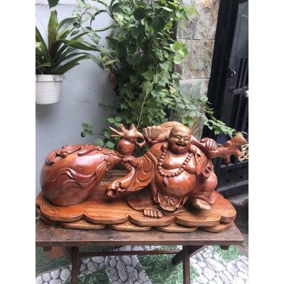 Tượng Gỗ Mỹ Nghệ Phật Di Lặc Kéo bao tiền to Kích thước dài 60cm x cao 30cm x Sâu 20cm  Anh Chị trưng phòng khách trong nhà , công ty ạ