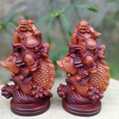 Tượng phật di lặc cưỡi cá chép bằng gỗ hương đá tô làm mầu giả cổ kt 23×13×8cm