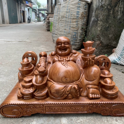 Tượng phật di lặc dâng tiền vàng bằng gỗ hương đá kt 50×23×20cm