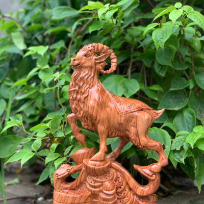 Tượng con dê phong thủy hút tài lộc bằng gỗ hương đá kt 50×17×13cm