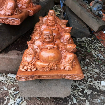 Tượng phật di lặc dâng tiền vầng ,bằng gỗ hương đá kt 40×23×22cm