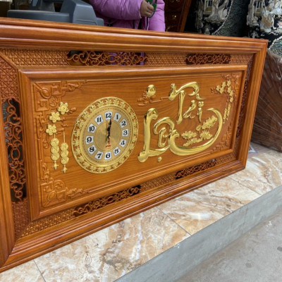 Tranh đồng hồ treo tường trạm khắc chữ tài lộc bằng gỗ gỗ đỏ kt 67×127×4.5cm