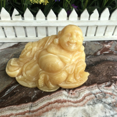 Tượng Phật Di Lặc ngồi trên thỏi vàng chiêu nạp tài lộc phong thủy đá ngọc hoàng long - Dài 16cm