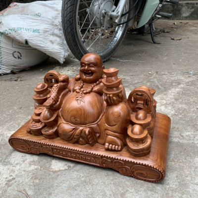 Tượng phật di lặc dâng tiền vàng bằng gỗ hương đá kt 50×23×20cm