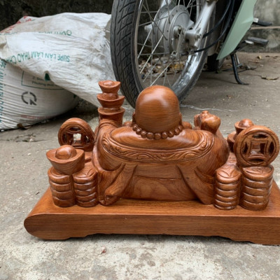 Tượng phật di lặc dâng tiền vàng bằng gỗ hương đá kt 50×23×20cm