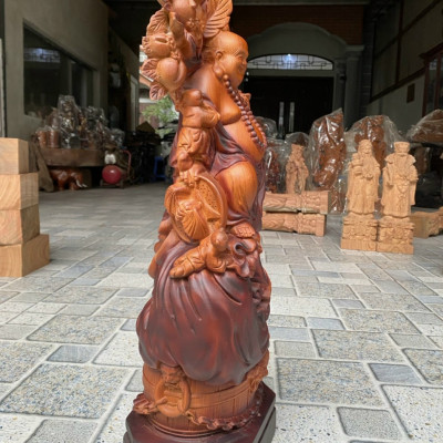 Tượng phật di lặc ngũ phúc gánh cành đào bằng gỗ hương đá tô làm mầu giả cổ  kt 60×24×14cm