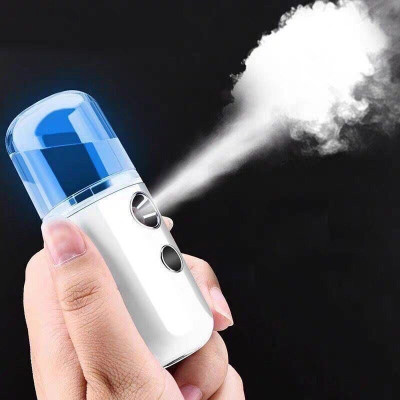 Sản phẩm dụng cụ trang điểm làm đẹp -Xịt khoáng nano , phun sương  mặt , mini cầm tay ,giúp giữ ẩm , mịn màng ,mát mẻ , không bị khô , nhỏ gọn dễ mang theo 