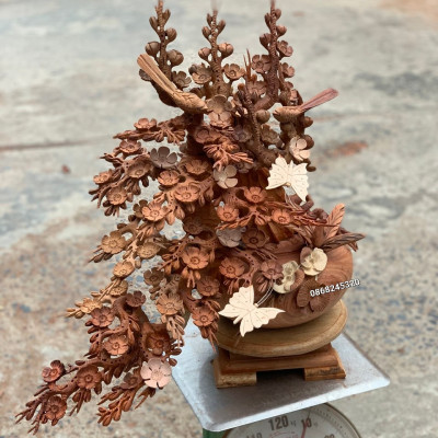 1 bình hoa mai phú quý dáng huyền phong thủy cầu tài lộc bằng gỗ hương ta đẹp long lanh 