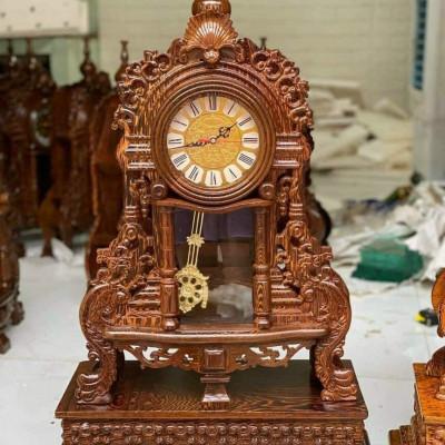 Đồng hồ quả lắc để bàn tân cổ điển bằng gỗ mun đuôi công kt cao 70×45×15cm và đế cao 15×52×29cm