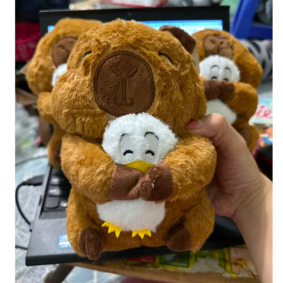 Thú nhồi bông capybara ôm vịt trắng đáng yêu - Size 22cm - Quà tặng gấu bông chuột lang capybara êm mịn cho bé.