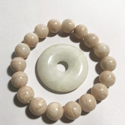 Vòng tay chuỗi hạt ngọc canxidene màu hồng phấn 16 li đá tự nhiên của Việt Nam vongtaychuoihat16li