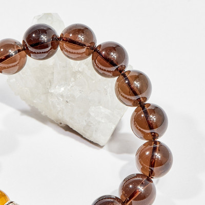 Vòng tay phong thủy đá thạch anh khói charm hoa văn 10mm mệnh thổ , kim - Ngọc Quý Gemstones