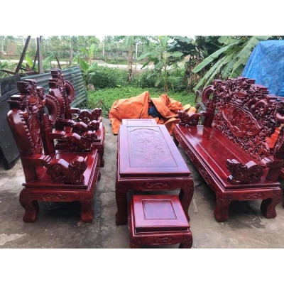 Bàn ghế phòng khách rồng khuỳnh nghê đỉnh gỗ xà cừ tay 12 bàn đục