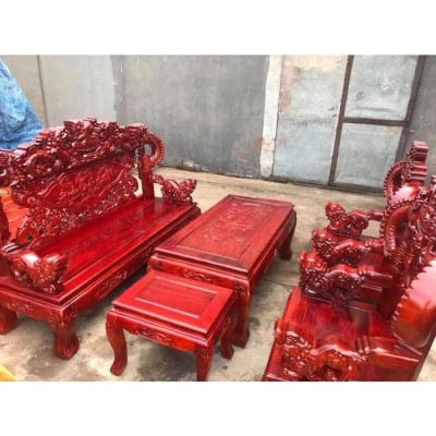 Bàn ghế phòng khách rồng khuỳnh nghê đỉnh gỗ xà cừ tay 12 bàn đục