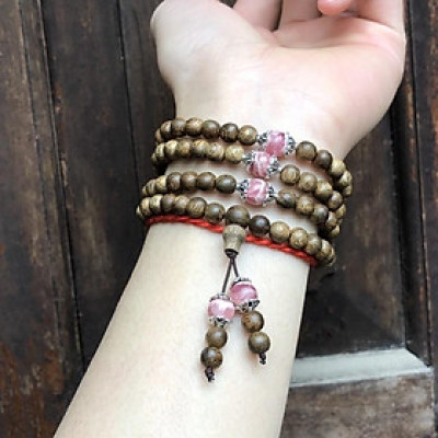 Vòng Tay Trầm Hương phối Đá Đào Hoa cùng charm bạc thái - bình an, may mắn, tài lộc